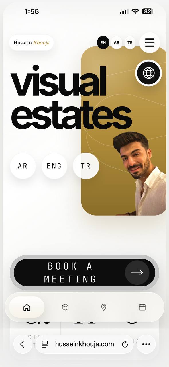 Hussein Khouja multilingual real estate portfolio homepage on mobile